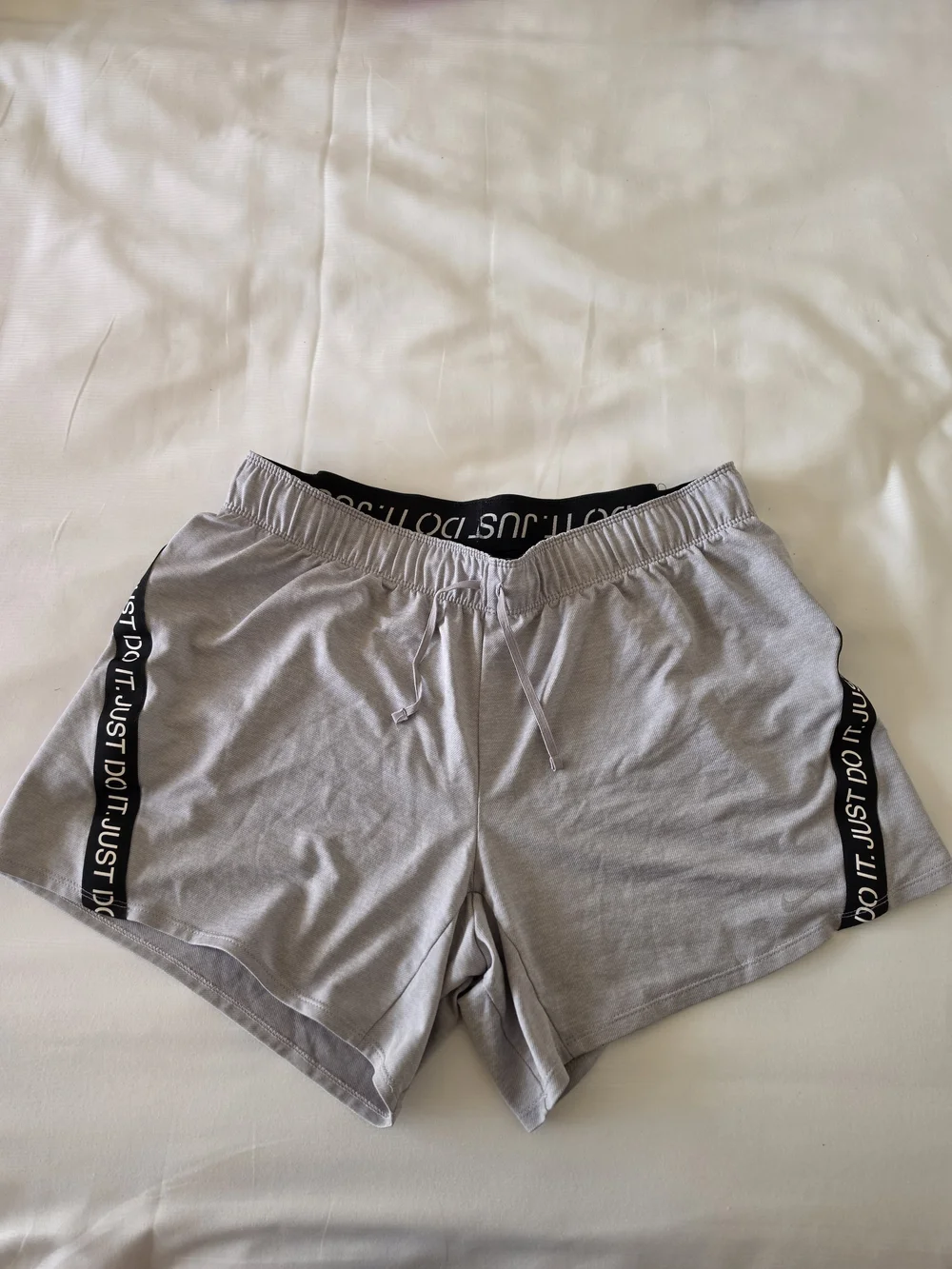 Nike Gray Women's Athletic Shorts with 'Just Do It' Trim